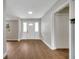 Modern entryway with hardwood floors and neutral-toned walls at 905 Valencia Rd, South Daytona, FL 32119
