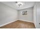 Bedroom with hardwood floors, ceiling fan and window at 905 Valencia Rd, South Daytona, FL 32119