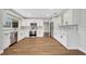 Modern kitchen with white shaker cabinets and stainless steel appliances at 905 Valencia Rd, South Daytona, FL 32119