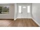 Bright and airy entryway with hardwood floors and neutral color scheme at 905 Valencia Rd, South Daytona, FL 32119