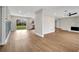 Spacious living room with hardwood floors and a modern fireplace at 905 Valencia Rd, South Daytona, FL 32119