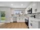 Modern kitchen with stainless steel appliances and backyard view at 905 Valencia Rd, South Daytona, FL 32119