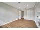 Bright bedroom with hardwood floors and double door closet at 905 Valencia Rd, South Daytona, FL 32119