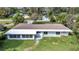 Ranch style home with a large backyard and spacious sunroom addition at 905 Valencia Rd, South Daytona, FL 32119