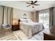 Main bedroom with king-size bed and direct access to the pool area at 973 Lake Berkley Dr, Kissimmee, FL 34746