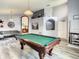Game room featuring a pool table and stylish decor at 973 Lake Berkley Dr, Kissimmee, FL 34746