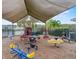 playground with shaded areas and various play equipment at 6540 S Goldenrod Rd # 69B, Orlando, FL 32822