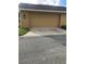 Attached garage with an automatic door opener at 6560 Candied Peel Aly, Winter Garden, FL 34787