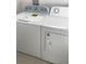 Laundry room with side-by-side washer and dryer at 6560 Candied Peel Aly, Winter Garden, FL 34787