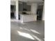 Open concept kitchen with stainless steel appliances and island at 6560 Candied Peel Aly, Winter Garden, FL 34787