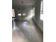 Bright and airy living room with tile floors and natural light at 6560 Candied Peel Aly, Winter Garden, FL 34787