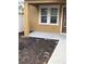 Small backyard with a patio and mulch landscaping at 6560 Candied Peel Aly, Winter Garden, FL 34787