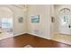 Bright living room with hardwood floors and neutral walls at 9016 Murano Mews Ct, Kissimmee, FL 34747