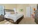 Large main bedroom with a king-size bed, nightstands, and large closet at 9016 Murano Mews Ct, Kissimmee, FL 34747