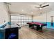 Fun game room featuring a pool table and air hockey at 9016 Murano Mews Ct, Kissimmee, FL 34747