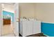 Convenient laundry room with washer and dryer at 9016 Murano Mews Ct, Kissimmee, FL 34747