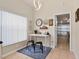 Home office space with built-in workspace and access to garage at 9016 Murano Mews Ct, Kissimmee, FL 34747