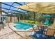 Inviting screened-in pool and patio area, perfect for entertaining at 9016 Murano Mews Ct, Kissimmee, FL 34747