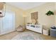 Bright office space with a large window, comfortable seating, and storage at 9016 Murano Mews Ct, Kissimmee, FL 34747