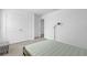Light and airy bedroom with a comfortable bed and closet at 14442 Noto Ave, Clermont, FL 34714
