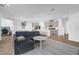Open concept living room, kitchen, and office area at 14442 Noto Ave, Clermont, FL 34714