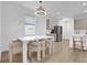 Modern kitchen with stainless steel appliances and light taupe cabinets at 14442 Noto Ave, Clermont, FL 34714