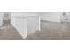 Spacious loft area with neutral carpeting at 14442 Noto Ave, Clermont, FL 34714