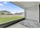 Peaceful screened porch overlooking backyard at 14442 Noto Ave, Clermont, FL 34714