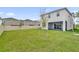 Spacious backyard with large grassy area at 14442 Noto Ave, Clermont, FL 34714