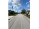 Residential street view showcasing a quiet neighborhood at 255 Abbotsbury Dr, Kissimmee, FL 34758