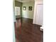Living room with dark hardwood floors at 255 Abbotsbury Dr, Kissimmee, FL 34758