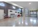 Spacious garage with an epoxy floor and custom mural at 4072 Bannock Ave, Tavares, FL 32778