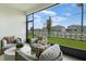 Relaxing screened porch overlooking a beautifully landscaped yard at 4072 Bannock Ave, Tavares, FL 32778