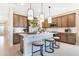 Modern kitchen with an island and stainless steel appliances at 4072 Bannock Ave, Tavares, FL 32778