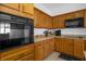 Well-equipped kitchen with built-in oven, microwave, and ample counter space at 4523 Ashtubula Ct, Orlando, FL 32818