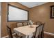 Bright dining room with table and chairs, ideal for Gathering meals at 4523 Ashtubula Ct, Orlando, FL 32818