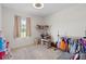Bright bedroom with ample closet space and large window at 6883 Botanic Blvd, Harmony, FL 34773