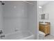 Simple bathroom with tub, shower, and single vanity at 9051 Treasure Trove Ln # 307, Kissimmee, FL 34747