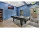 Game room with pool table and book shelves at 9051 Treasure Trove Ln # 307, Kissimmee, FL 34747