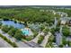 Community overview featuring pool, clubhouse, and convenient parking at 9051 Treasure Trove Ln # 307, Kissimmee, FL 34747
