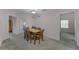 Dining area with table and chairs, carpet flooring at 9051 Treasure Trove Ln # 307, Kissimmee, FL 34747