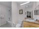 Clean bathroom with a tub, toilet and vanity at 9051 Treasure Trove Ln # 307, Kissimmee, FL 34747