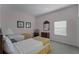 Charming bedroom with twin beds and a dresser at 9051 Treasure Trove Ln # 307, Kissimmee, FL 34747