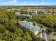 Aerial view showcasing building and neighborhood at 9051 Treasure Trove Ln # 307, Kissimmee, FL 34747