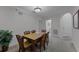 Dining area with table and chairs, bathroom access at 9051 Treasure Trove Ln # 307, Kissimmee, FL 34747