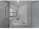 Relaxing bathroom with corner bathtub and shower at 9051 Treasure Trove Ln # 307, Kissimmee, FL 34747