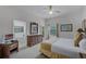 Bright bedroom with king-size bed and en-suite bathroom at 9051 Treasure Trove Ln # 307, Kissimmee, FL 34747