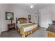 Cozy bedroom with king-size bed and access to the bathroom at 9051 Treasure Trove Ln # 307, Kissimmee, FL 34747