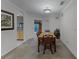 Dining area with table and chairs, kitchen access at 9051 Treasure Trove Ln # 307, Kissimmee, FL 34747