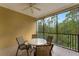 Private balcony with seating area and ceiling fan at 9051 Treasure Trove Ln # 307, Kissimmee, FL 34747